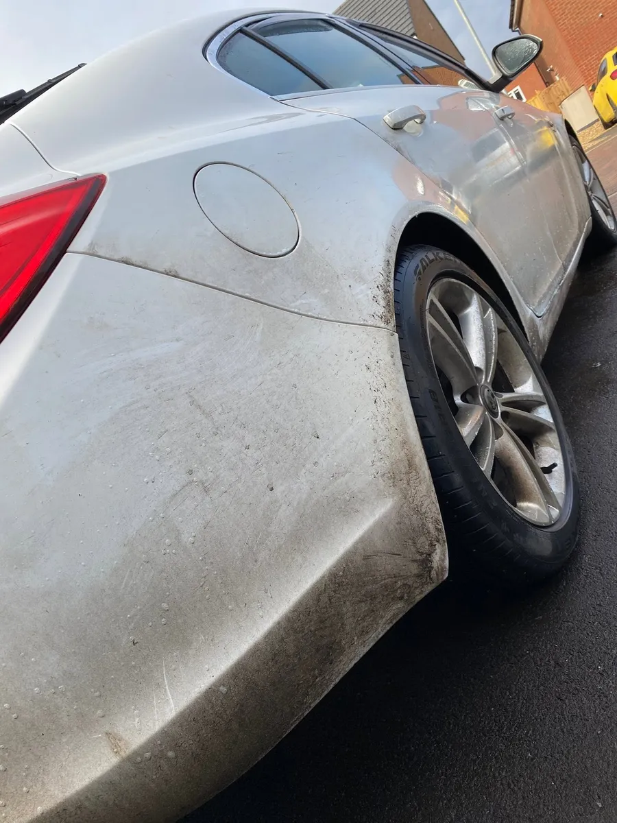 White saloon exterior dirty before valeting in Louth